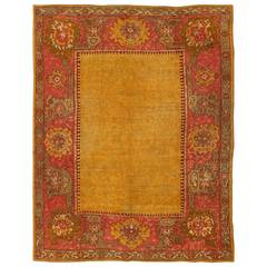 Antique Turkish Oushak Rug in Gold, Soft Orange, Rose, Green, Pink and Taupe