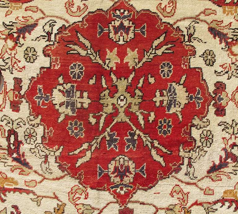 Hand-Knotted Antique Turkish Sivas Rug with Red, Taupe, Light Green and Cream Colors For Sale