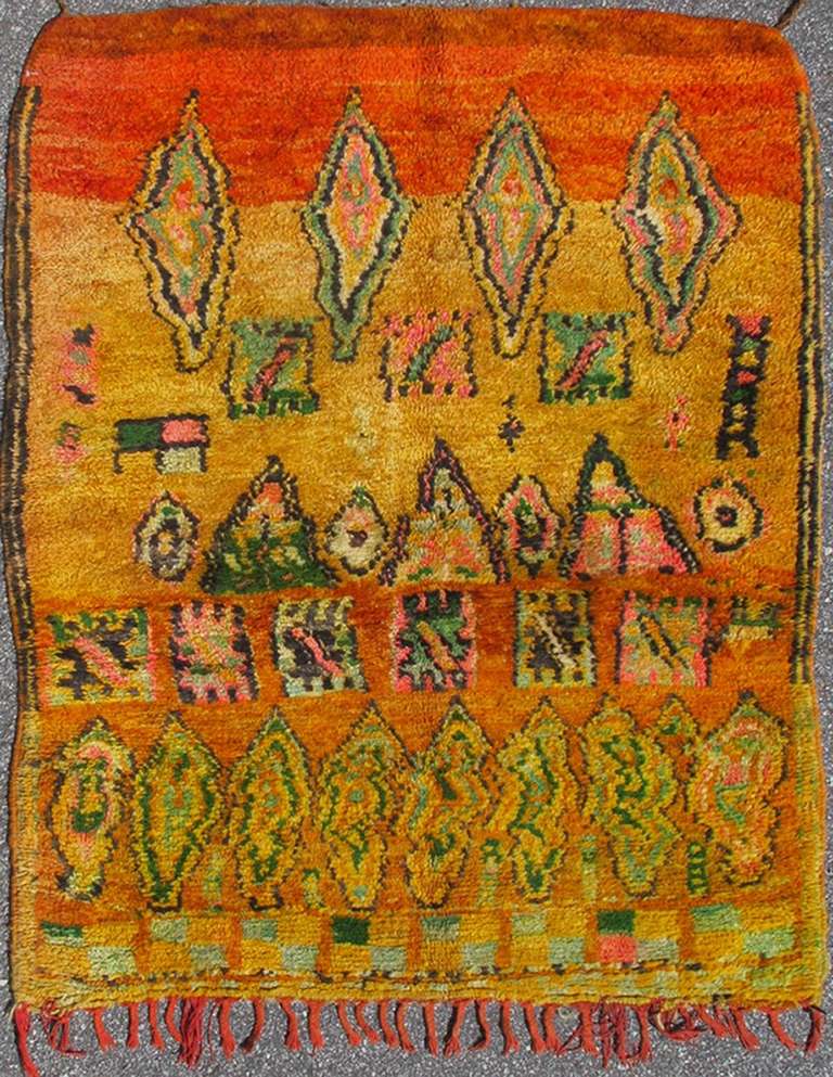 This vivid Moroccan rug displays a random design of organic patterns. With an artistic and original village weaving, this piece is a representation of the landscape of the high Atlas mountain. 4'3 x 5'6.
Original price: $4,500.
Reduced price: