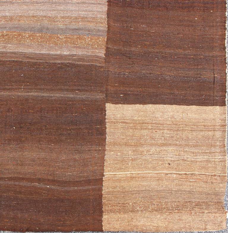 Large Hand Woven Vintage Kilim in Six Panels.  Keivan Woven Arts /rug#EN-140470.  Large vintage Flat weave kilim, made in Turkey

Measures: 11'7 x 16'8

Six panels vintage kilim in square and rectangular shapes in Dark Brown, Light Brown, Taupe &