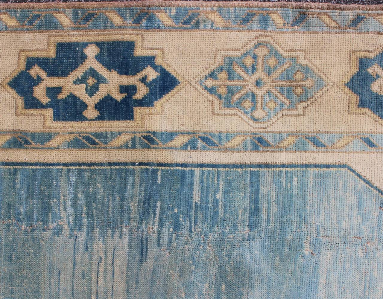 Hand-Knotted Vintage Turkish Rug with Central Medallion in Sky Blue, Ivory and Cream Tones