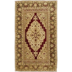 Antique Oushak Carpet with Geometric Design in Cranberry, Green and Mocha