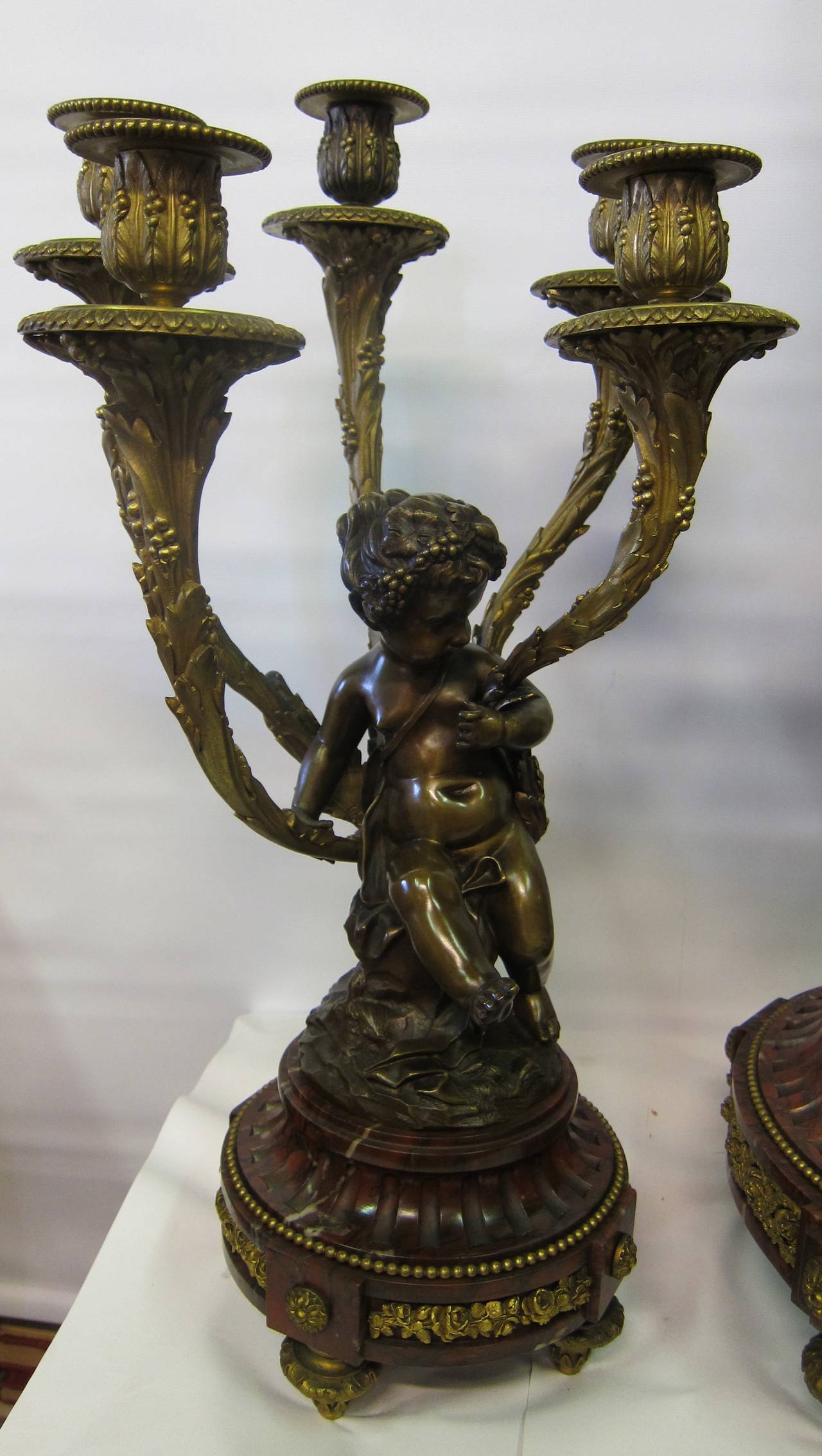 "L' Amour Vainqueur, " French Patinated Bronze Sculpture Clock Set