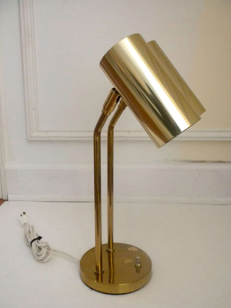 Adjustable brass desk lamp by Koch & Lowy. Measures 19.5