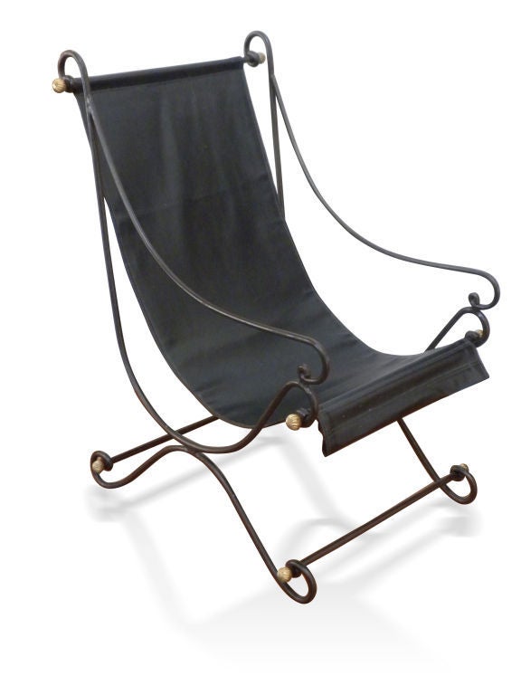 A very well made and heavy campaign chair. The black leather like vinyl seat sling is double sided and adjustable. Dismantles easily and shipping is free.