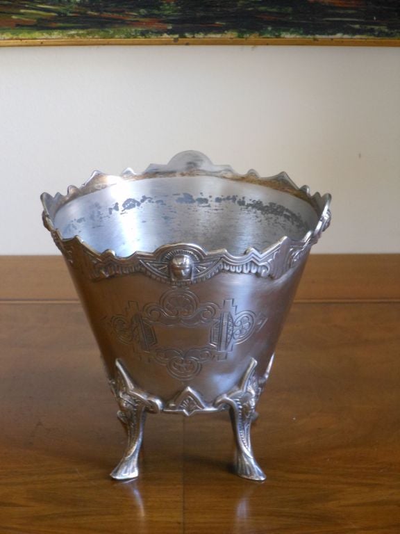 A wonderful small waste basket in the aesthetic movement style with incredible details. Made in 1865 by Rogers Smith & Co. Founded by William Rogers and George Smith in 1857 to manufacture silver plate and Brittania ware. The Company was originally