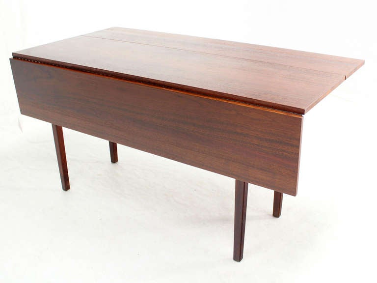Oiled walnut mid century modern drop leaf table. Open width measure 42".