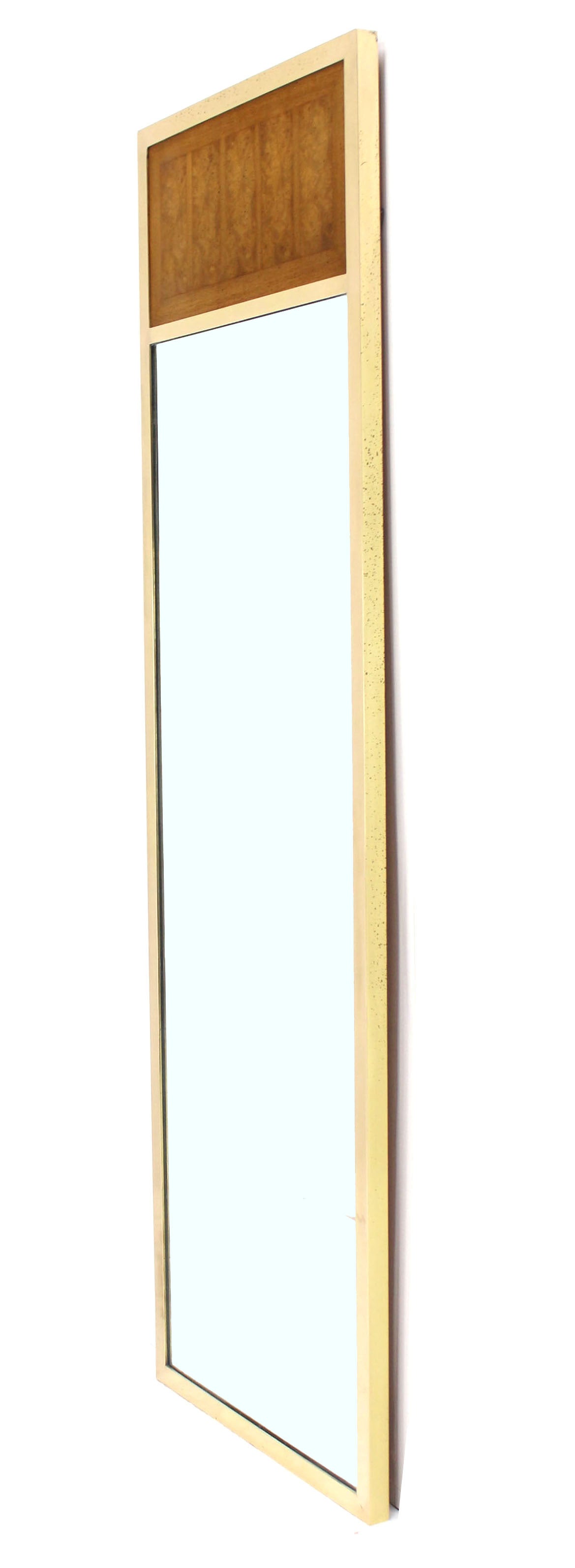 Solid brass frame mid-century modern mirror in style of Paul McCobb.