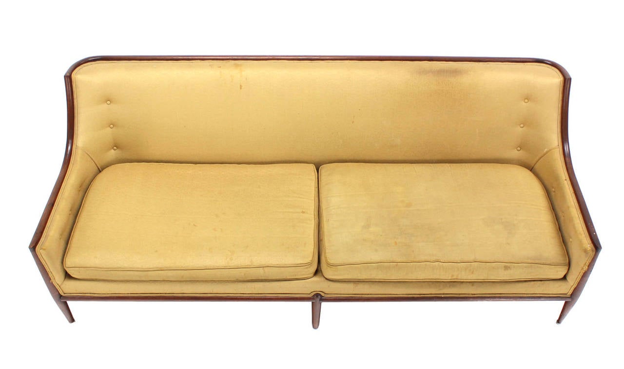 Very nice mid century modern design walnut frame sofa. As is upholstery.
