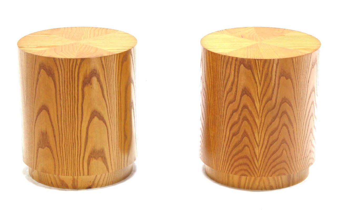 Pair of mid-century modern drum shaped side tables pedestals.