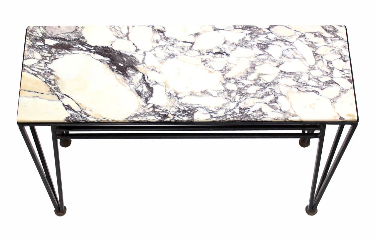 Very nice mid century modern console with marble top and matching 20x25 mirror.
