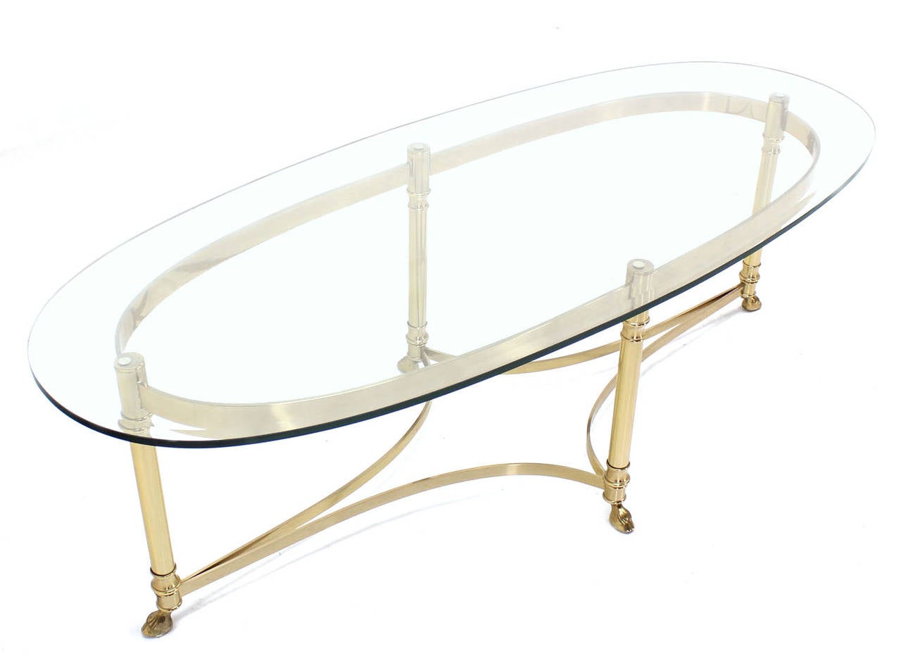 Brass Base and Glass-Top Oval Coffee Table with Hoof Feet 1