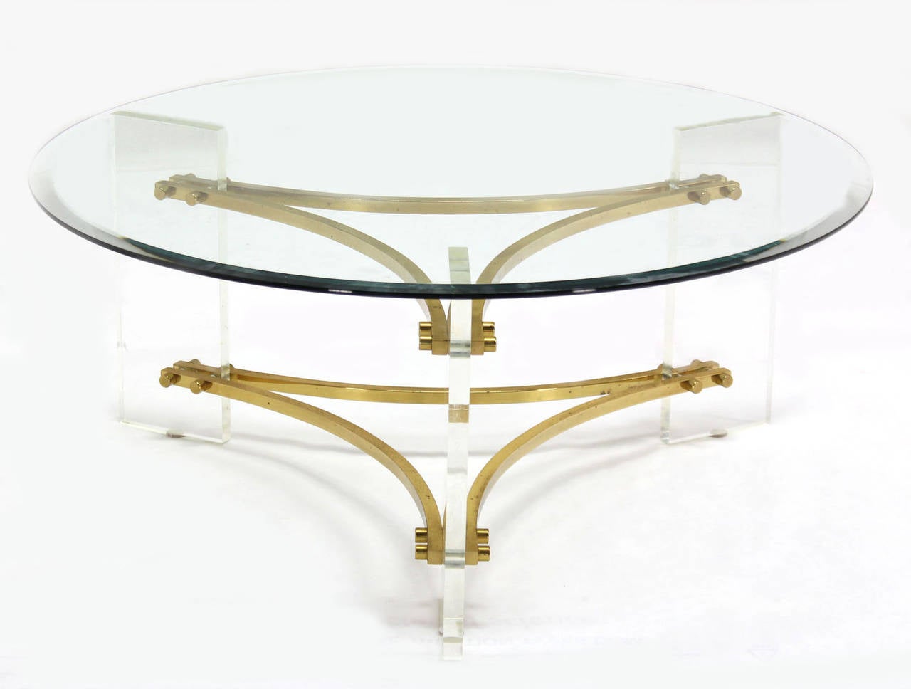 Very nice mid-century modern lucite and brass coffee table. Good vintage condition.