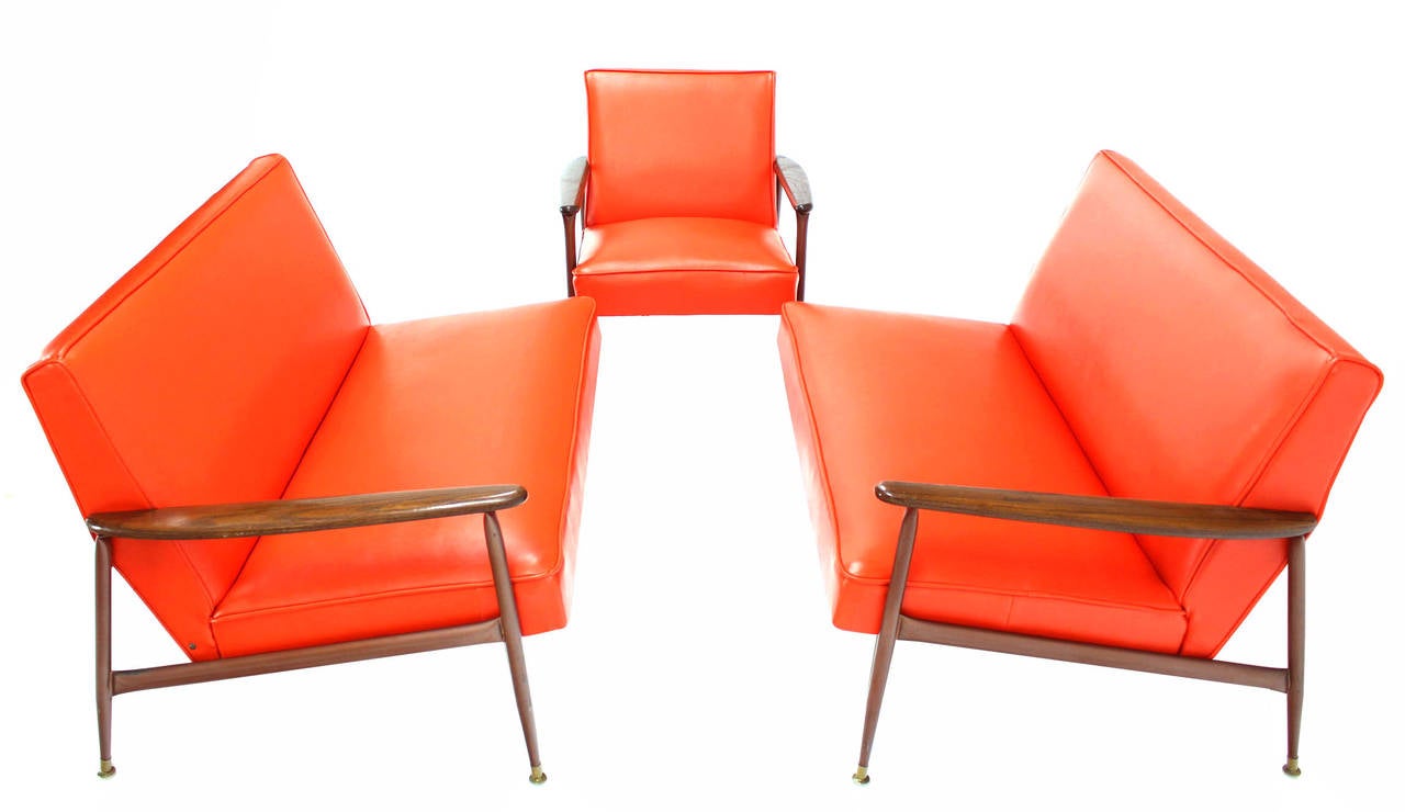 Nice mid-century modern orange vinyl sectional.