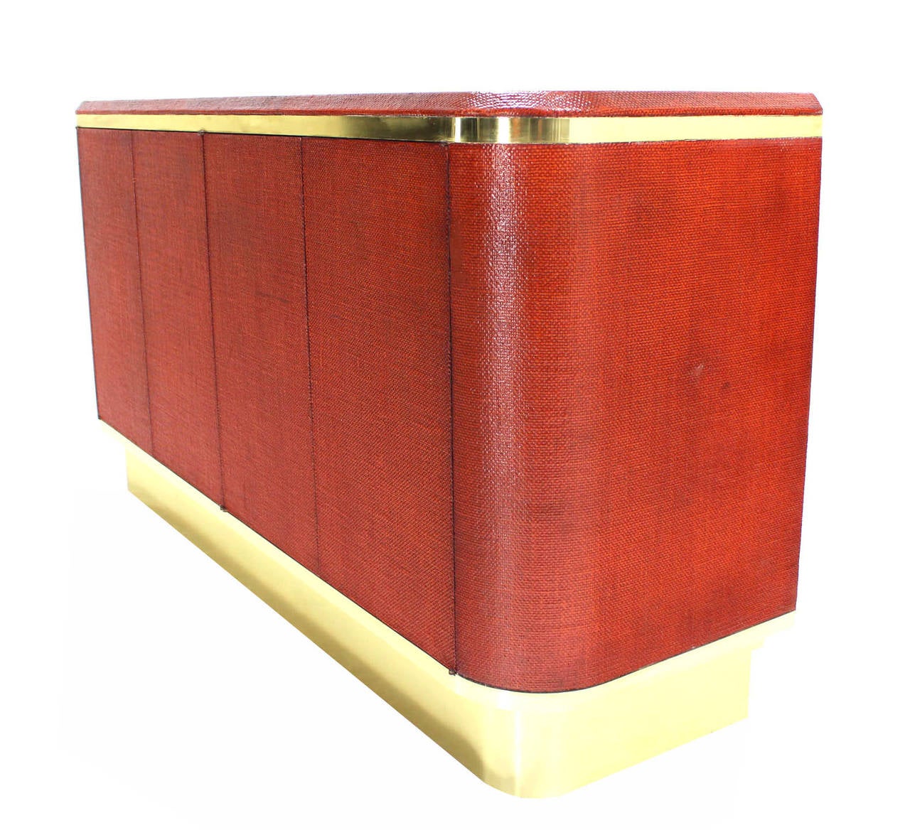 Brick red color grass cloth with brass trim mid-century modern credenza possibly designed by Karl Springer.