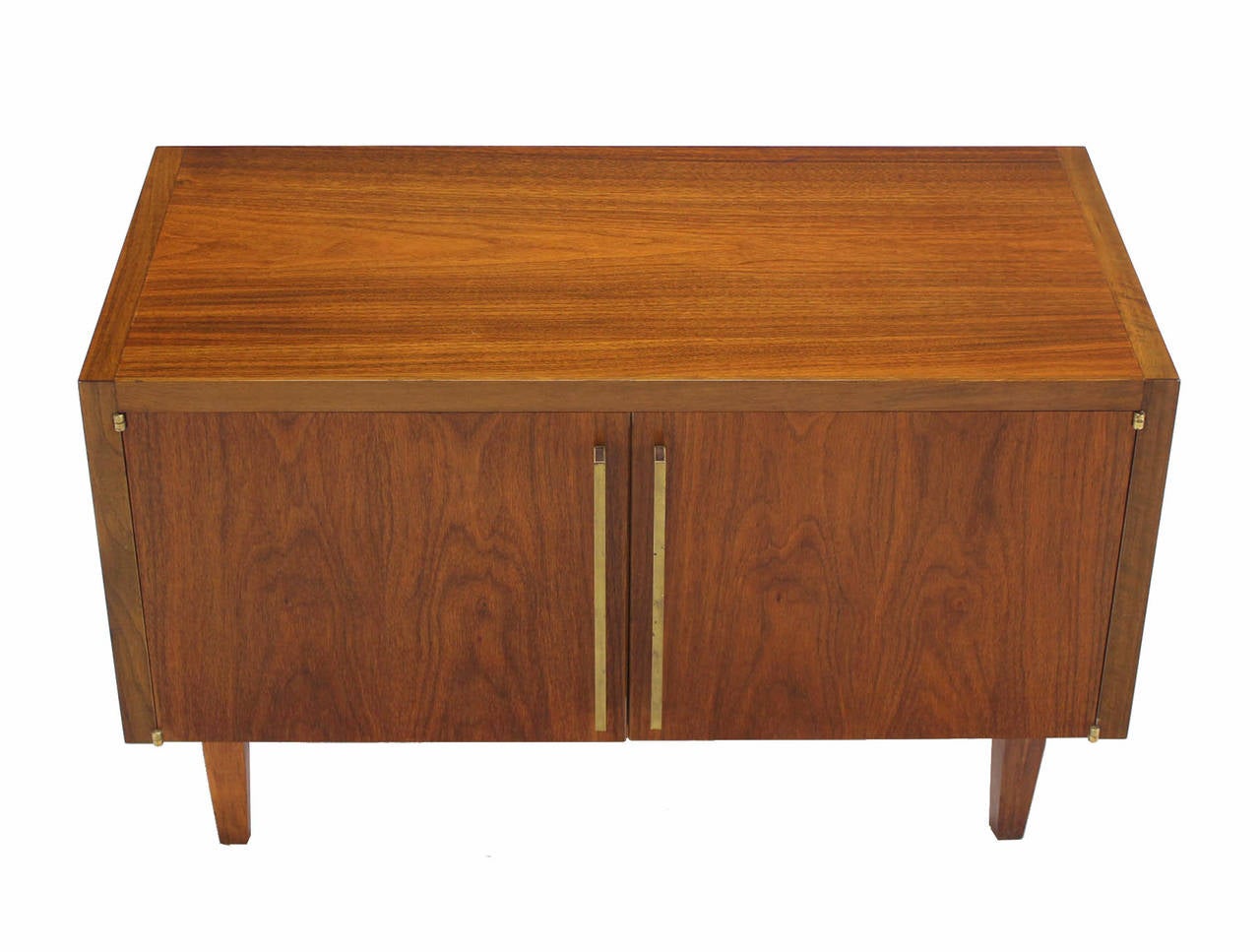 Very nice quality mid-century modern walnut two doors mini credenza with solid brass hardware.