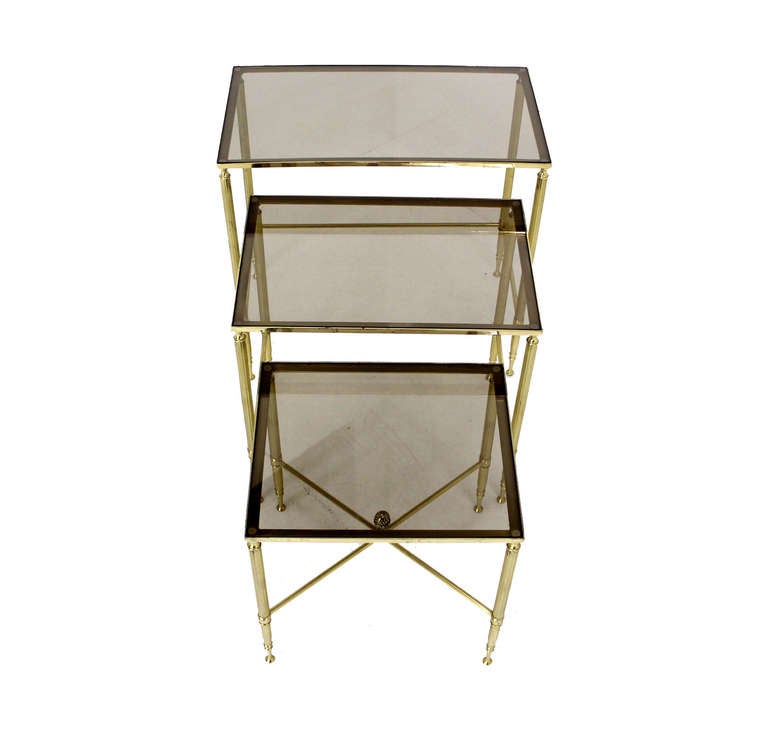 Set of three mid century modern solid brass stacking end tables.