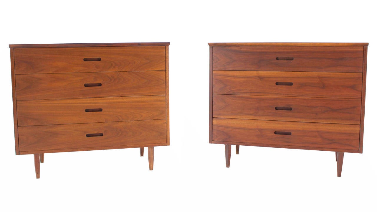 Pair of mid-century modern oiled walnut bachelor chests.