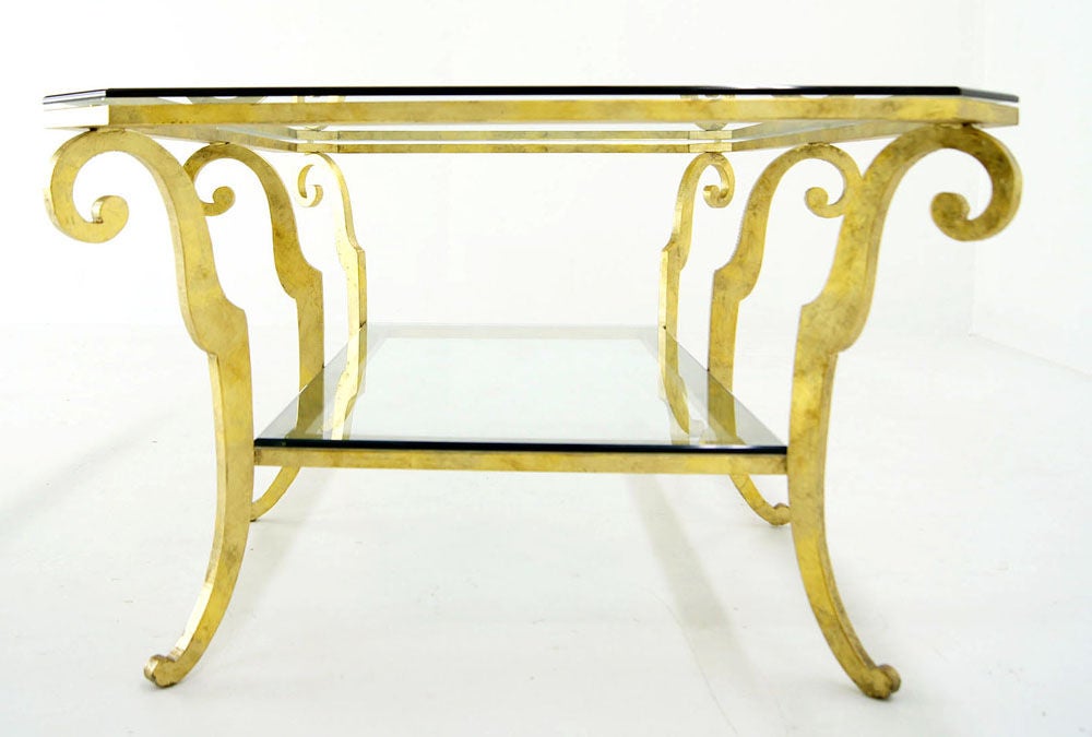 Nice heavy base hollywood regency style coffee or center table.