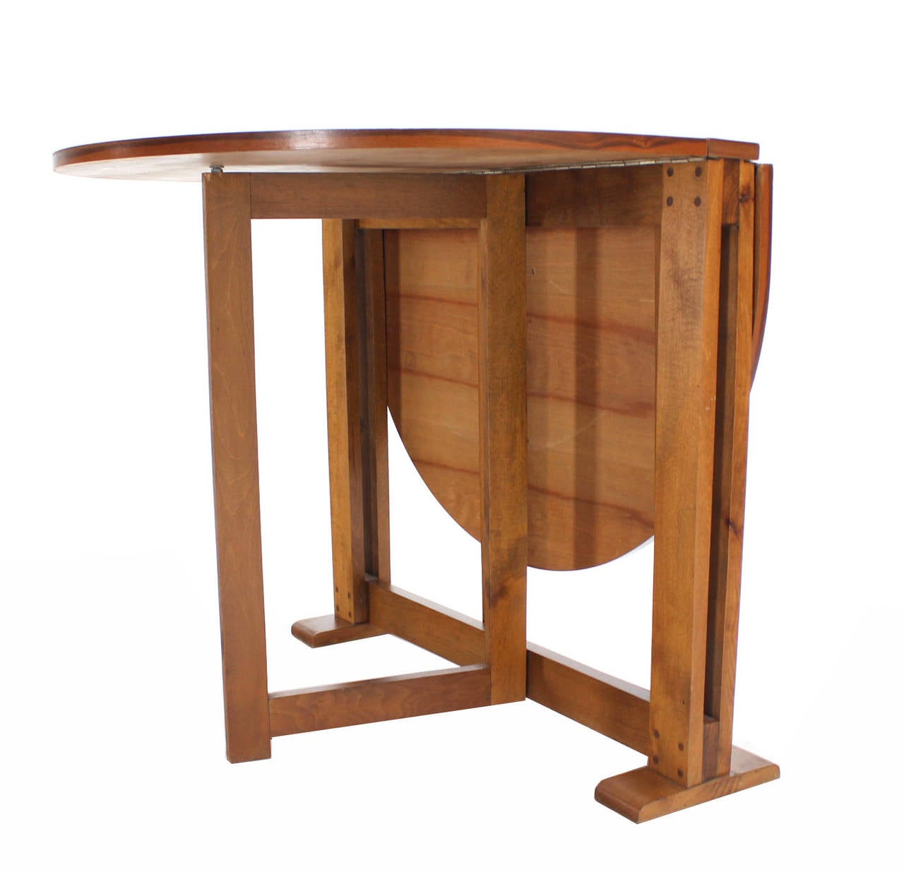 Low profile drop leaf table that expands into nice size 34x46 inches dining table.