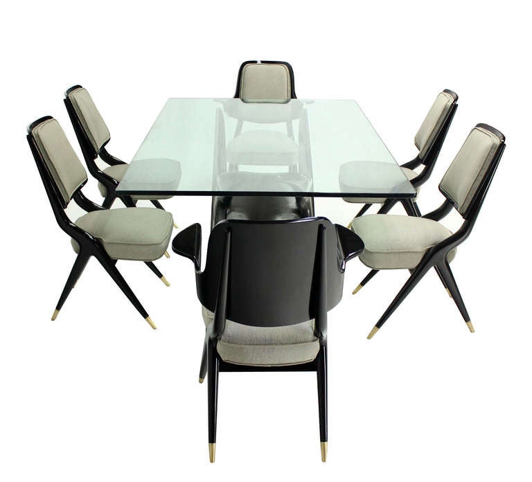 Very nice italian modern style dining set possibly designed by Ico Parisy.
Excellent vintage condition.
Table 71x44x30, side chair 17x24x35