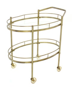 Oval Brass and Glass Two Tier Tea Cart on Wheels