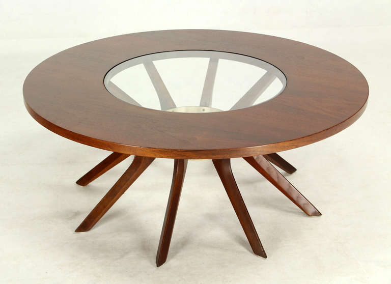 Very nice mid century modern walnut and glass top coffee table. in excellent shape.