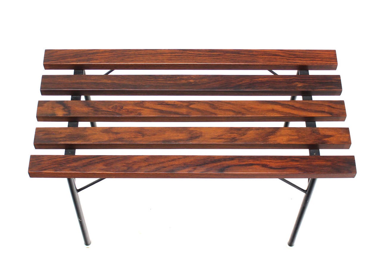 Small mid century modern rosewood hall bench. 30 inches long.