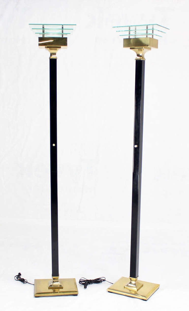 Pair of very nice mid century modern torcheres floor lamps with built in dimmers.