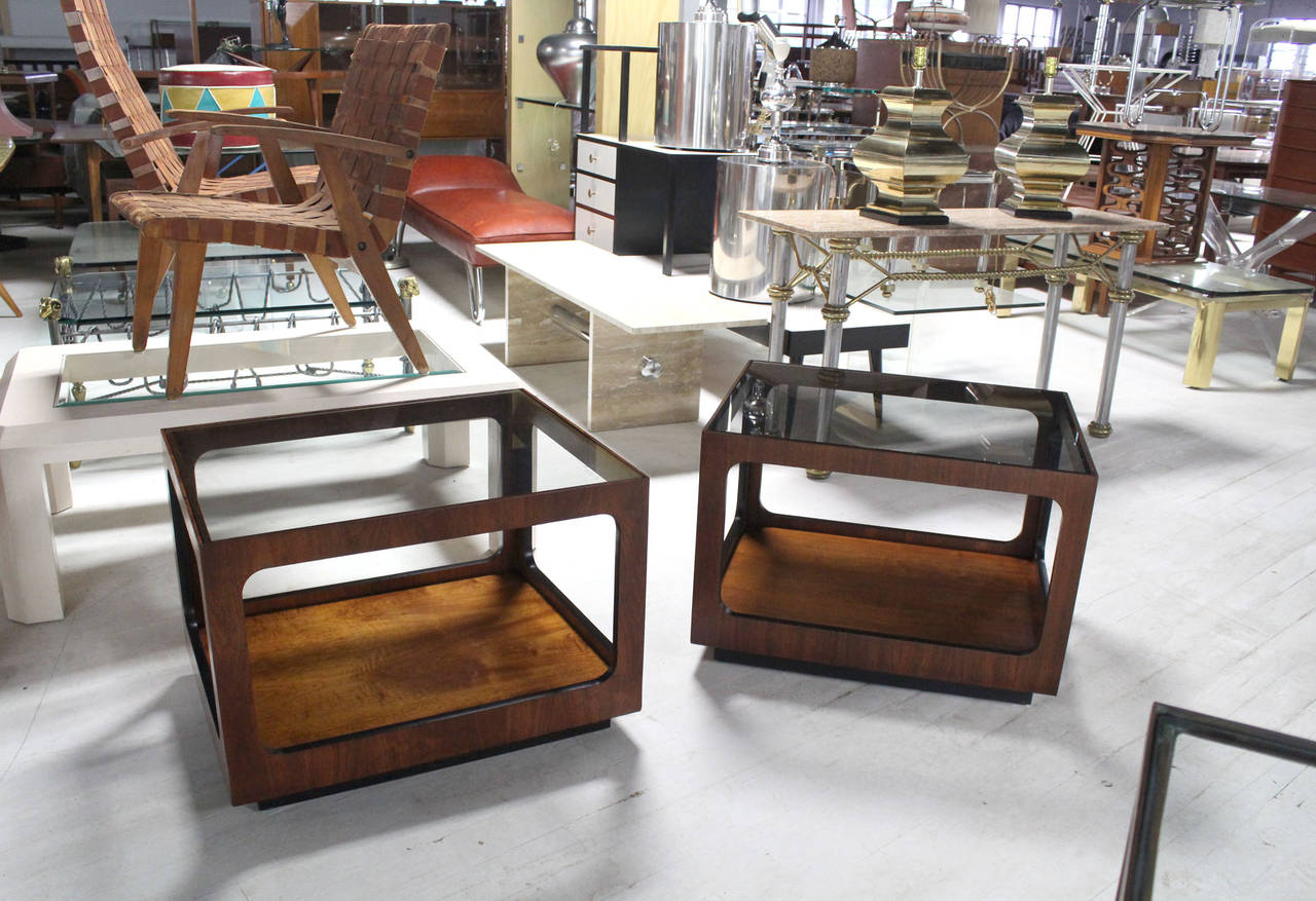 Pair of very nice walnut end tables with glass tops.