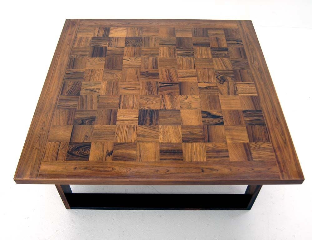 Very Beautiful parquet top rosewood coffee table. Very solid and steady design.