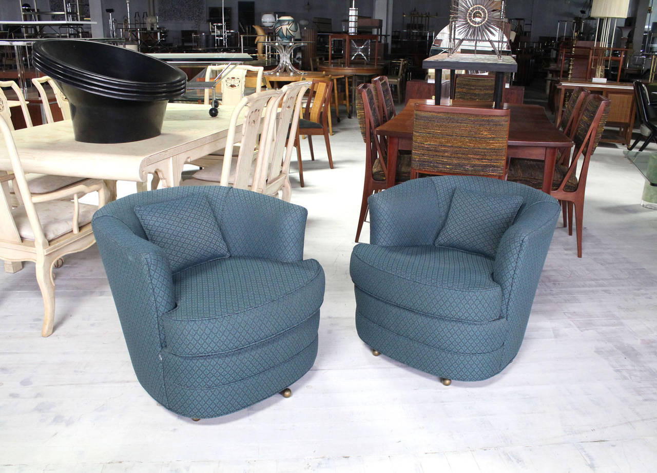 Nice pair of swivel barrel back chairs in style of M. Baughman.