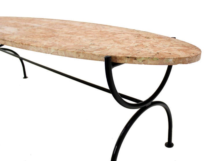 Very nice mid-century modern design rouge marble top coffee table in style of Paul McCobb.