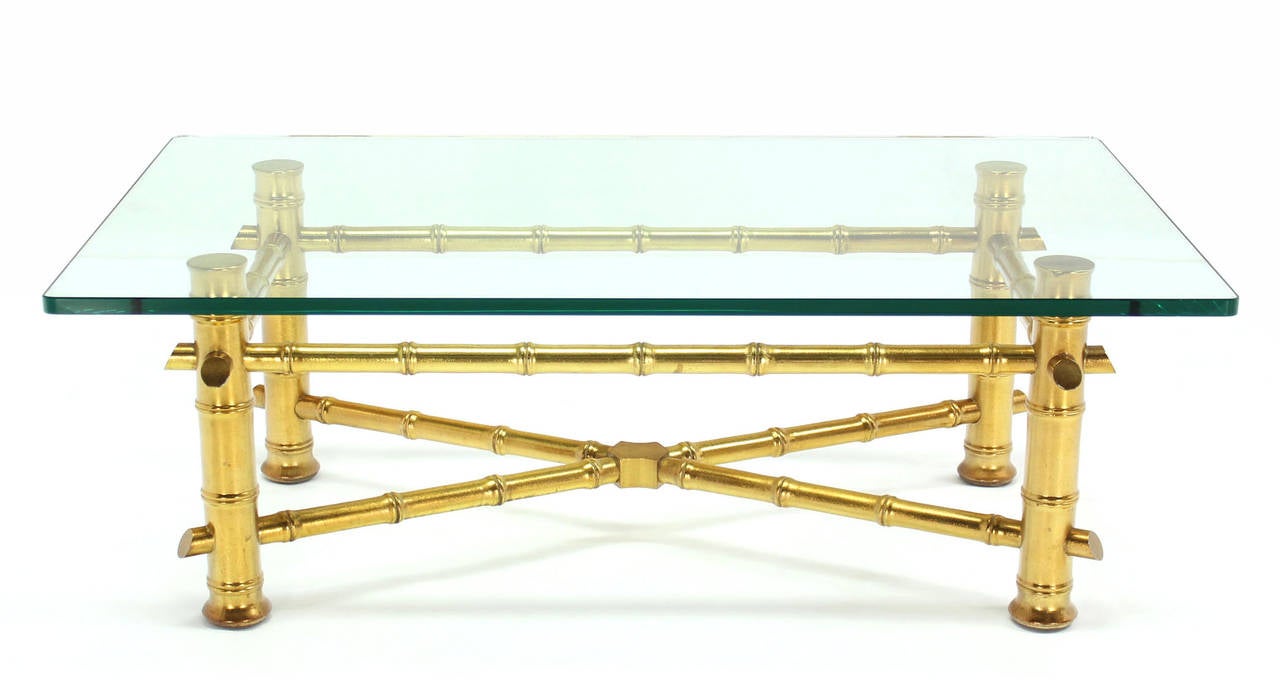 Rectangular  gold leaf faux bamboo base coffee table with 3/4 inch thick glass top.