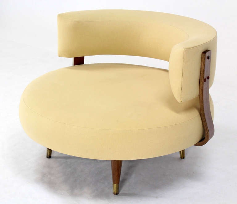 Newly upholstered mid century modern round lounge chair.