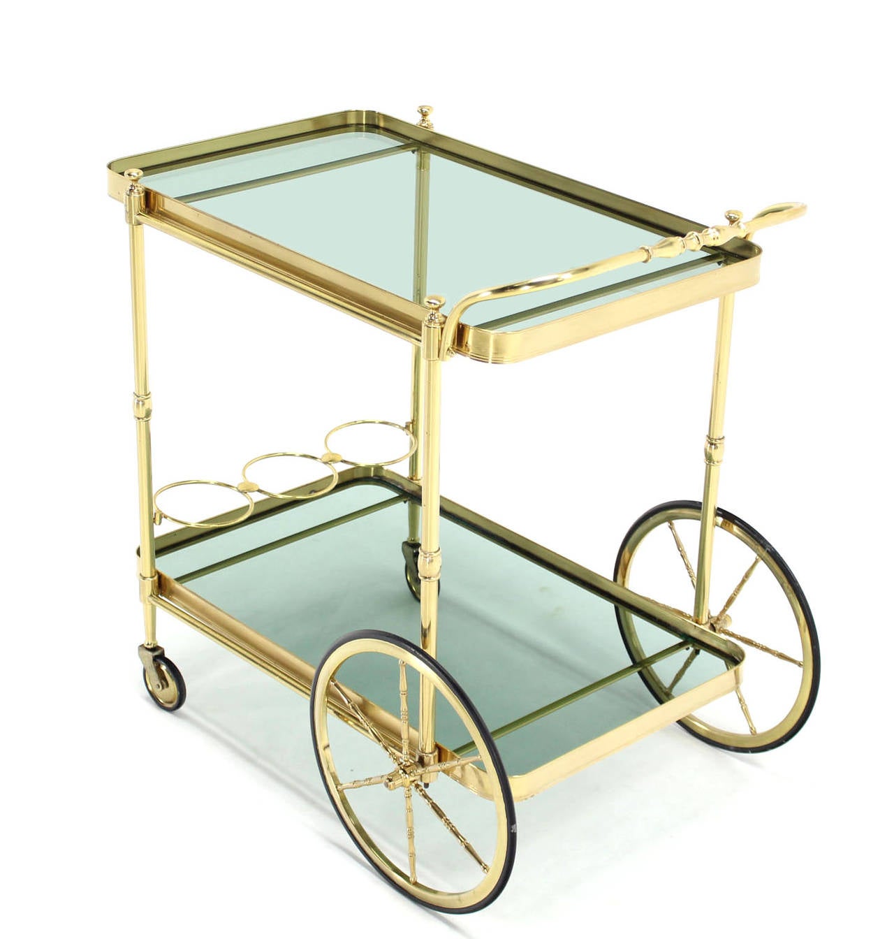 Very nice looking brass and green shade glass shelves tea cart.