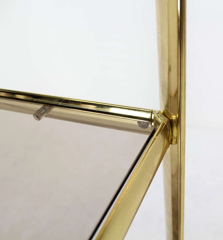 High quality craftsmanship mid century modern brass etagere display vitrine.
