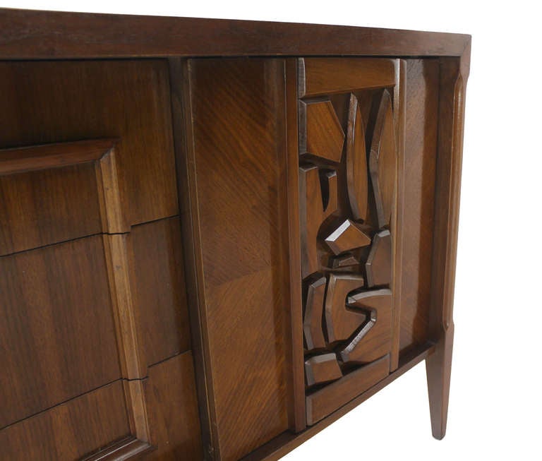 Very nice mid century modern sculptural front walnut dresser.