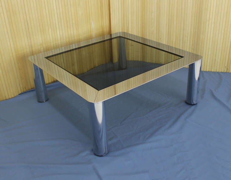 Very nice mid century modern chrome and glass coffee table.