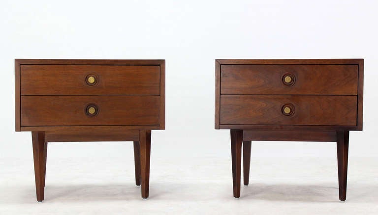 Very nice pair of Mid-Century Modern walnut nightstands end tables in excellent original condition.