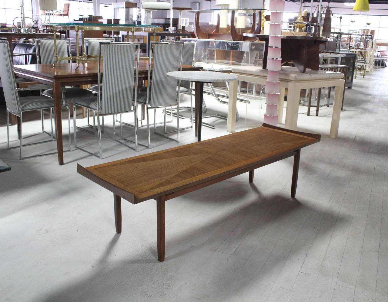 Very nice danish modern walnut coffee table with rolled ends. Mint condition.