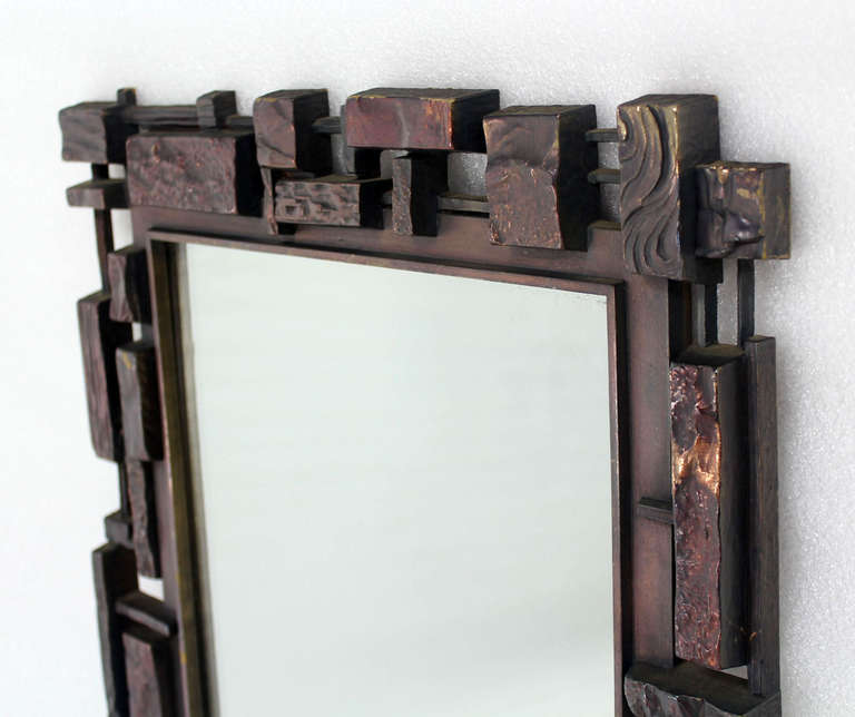 Very nice design mid century modern city scape style molded frame mirror.
