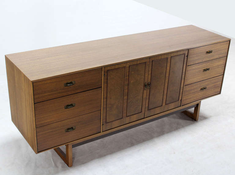 Nice vintage long sideboard credenza on frame shape legs. Good vintage condition.