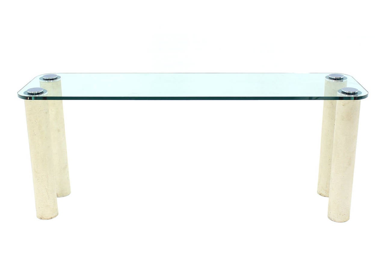 Mid century modern thick 3/4" glass console table on thick round marble or travertine cylinder legs.