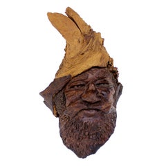 Detailed Burl Wood Carving of an Elf or Gnome Face Sculture