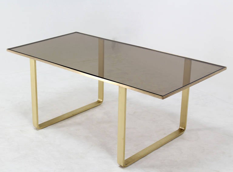 Very nice solid brass and smoked glass top Mid-Century Modern coffee table.