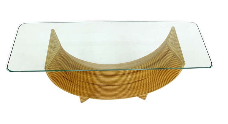 Nice vintage rattan base glass top console table.