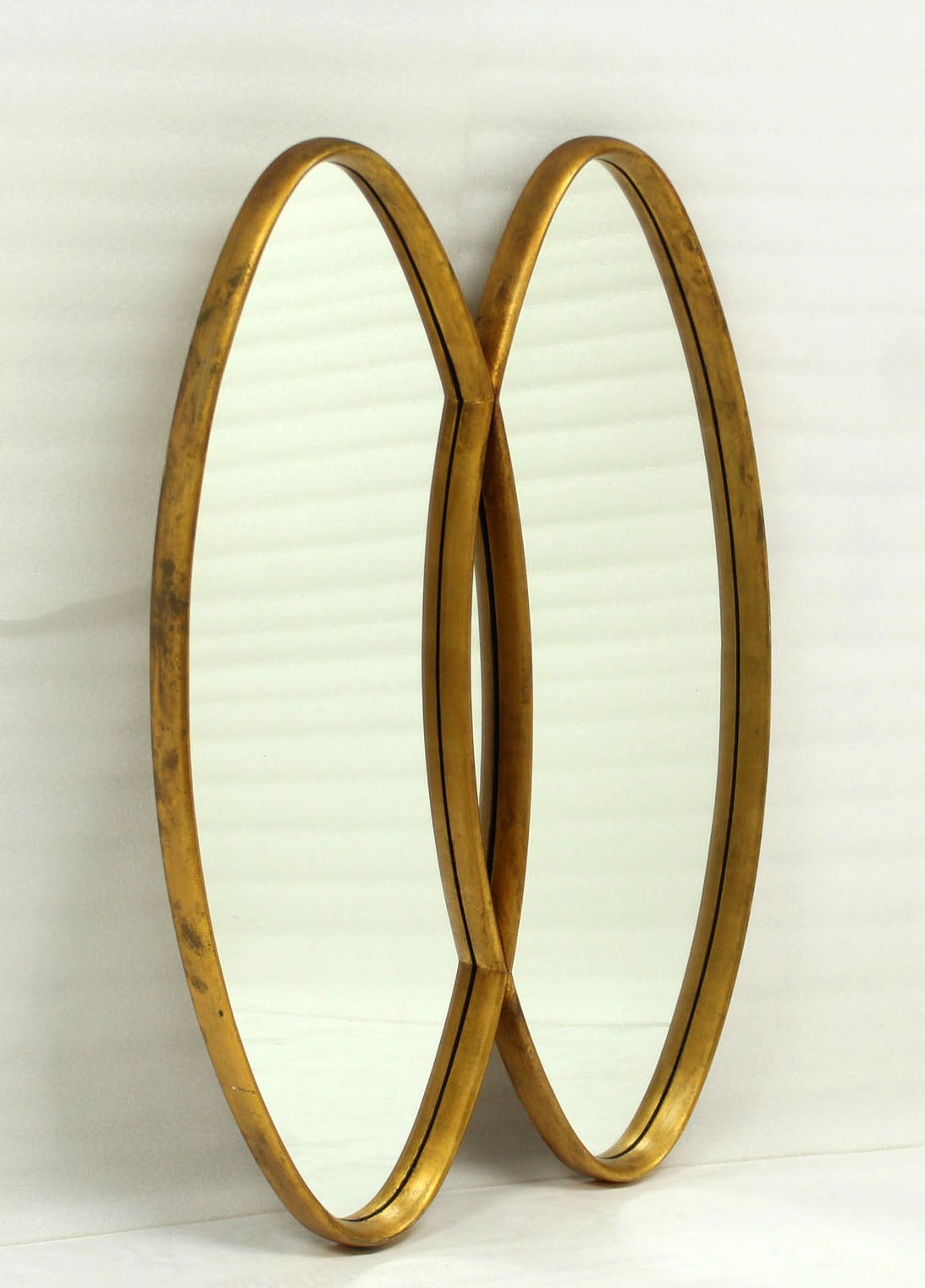 Double overlapping oval mid century modern wall mirror. Fine craftsmanship real wood frames.