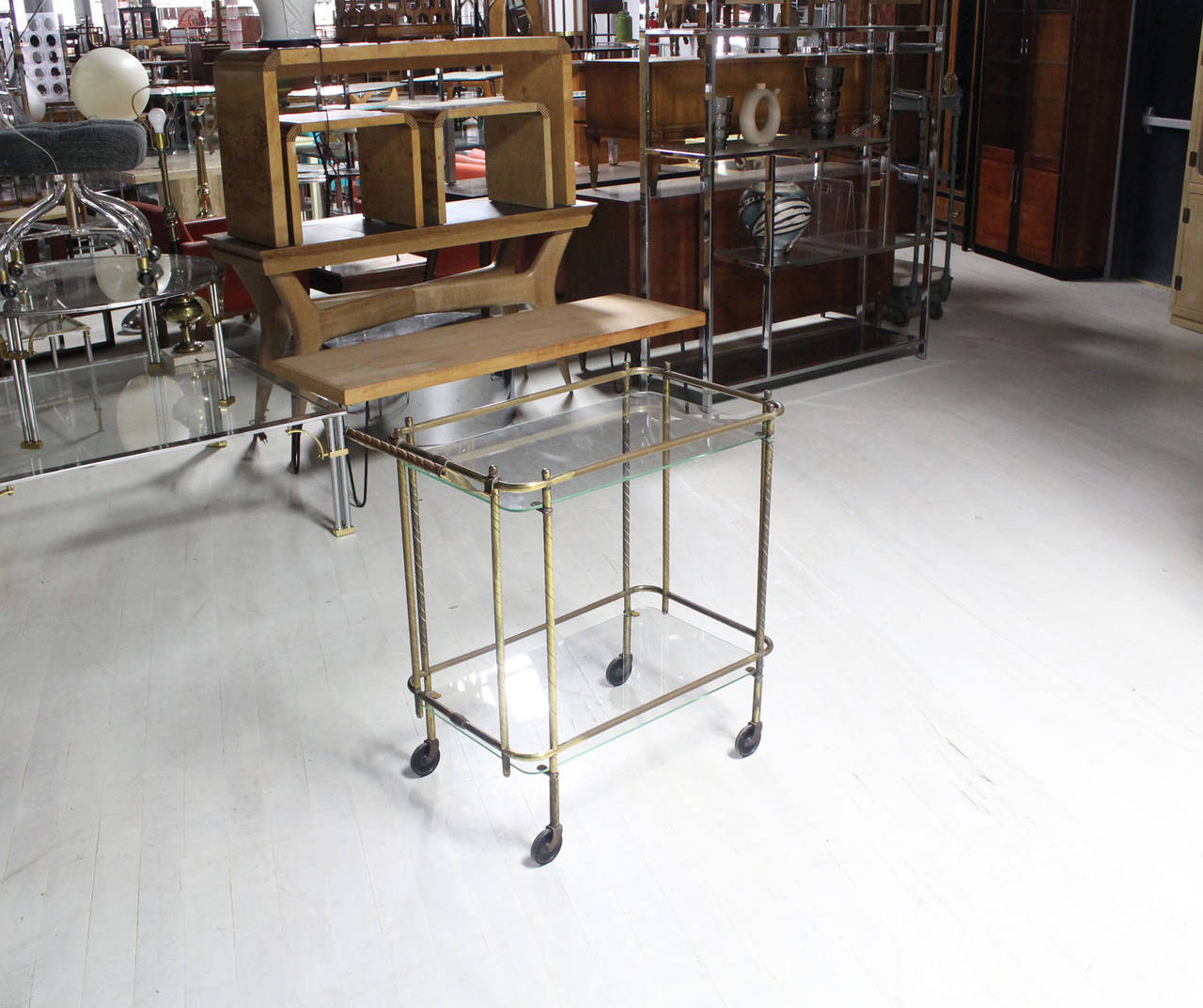 Mid Century modern brass and glass rolling tea cart.