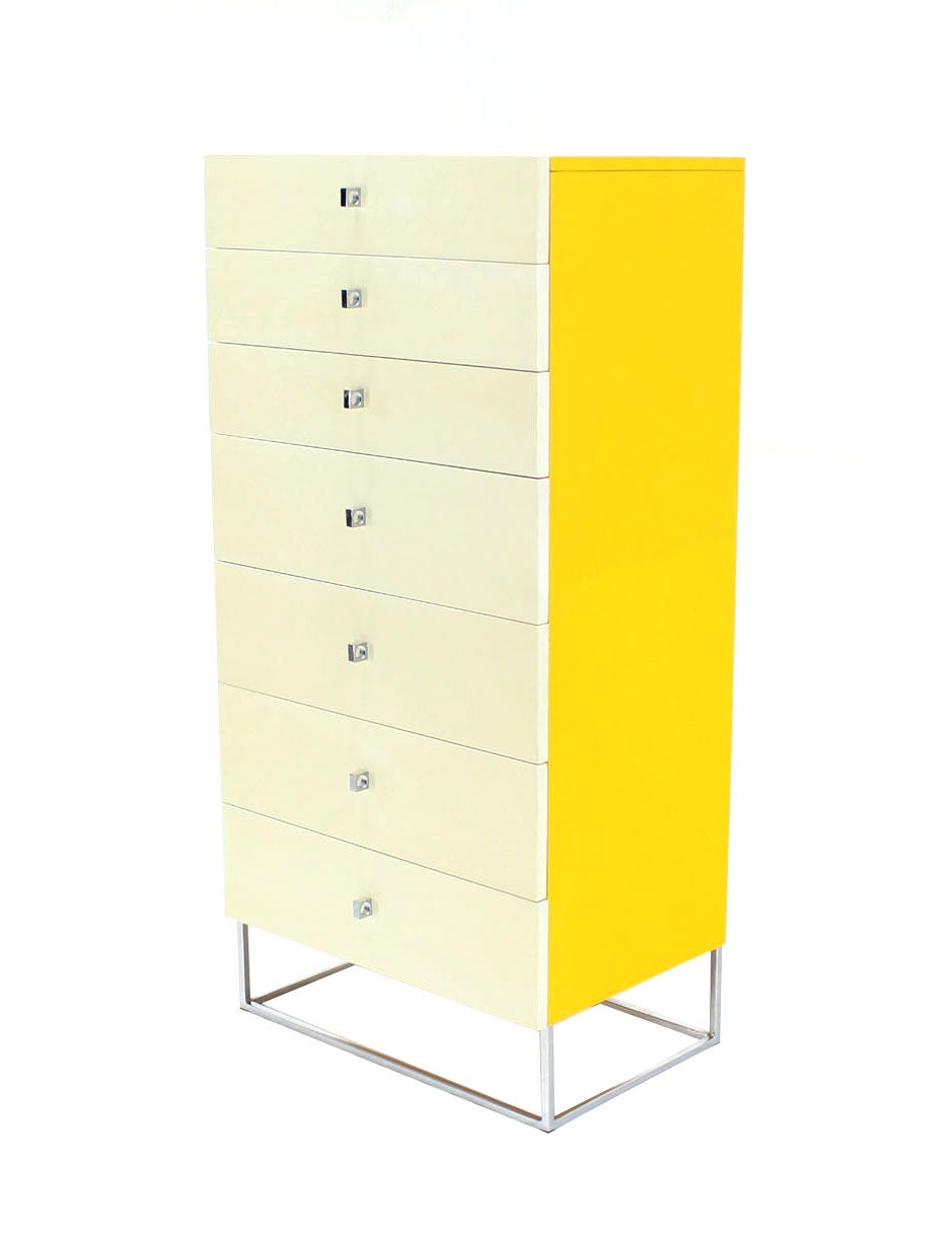 Sleek design Mid-Century Modern two tone lacquer high chest on square chrome base.